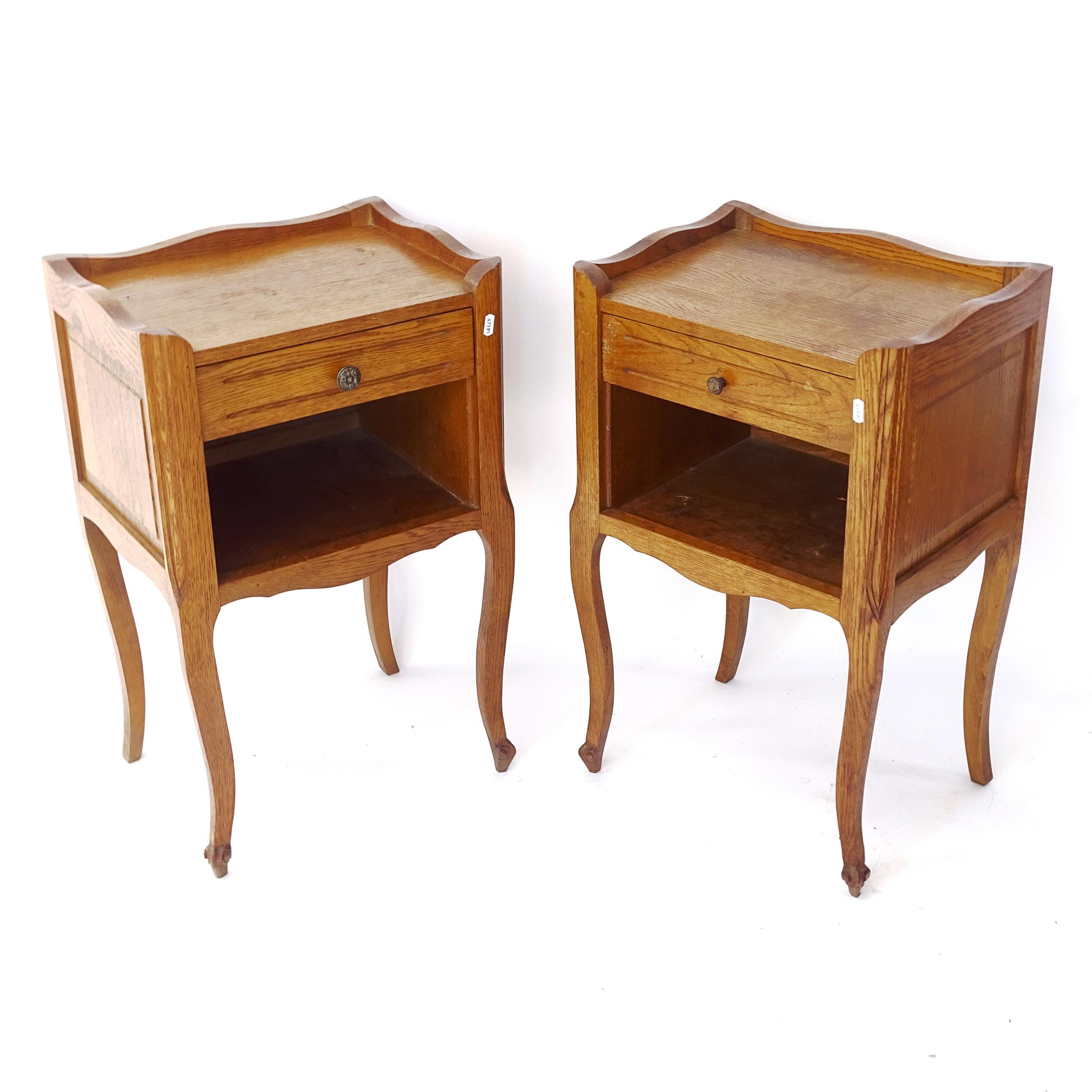 A pair of French oak bedside tables, with single frieze drawer, W44cm, H70cm, D32cm