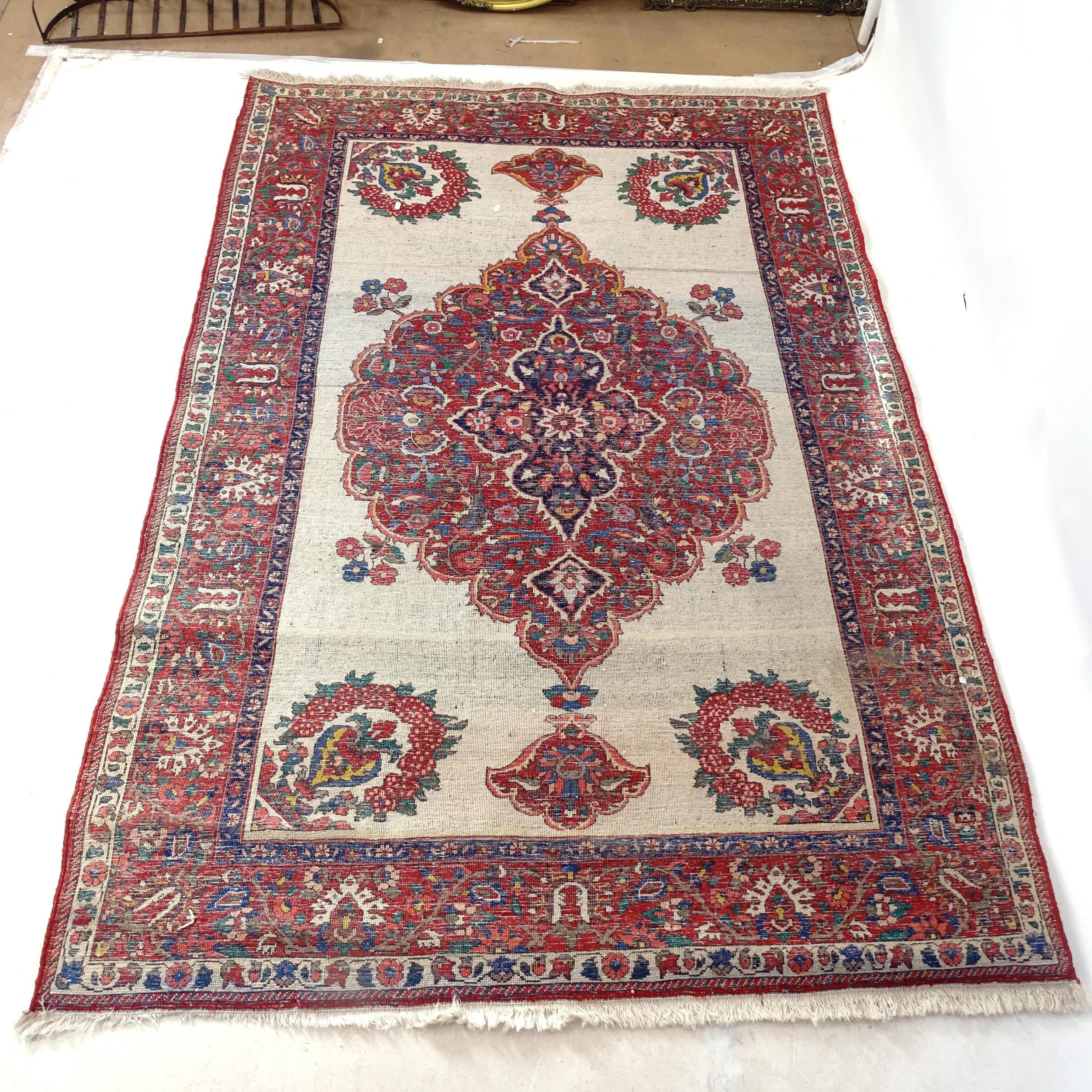 A red and cream ground Persian design rug, with symmetrical pattern and lozenge, 230cm x 160cm - Image 2 of 2