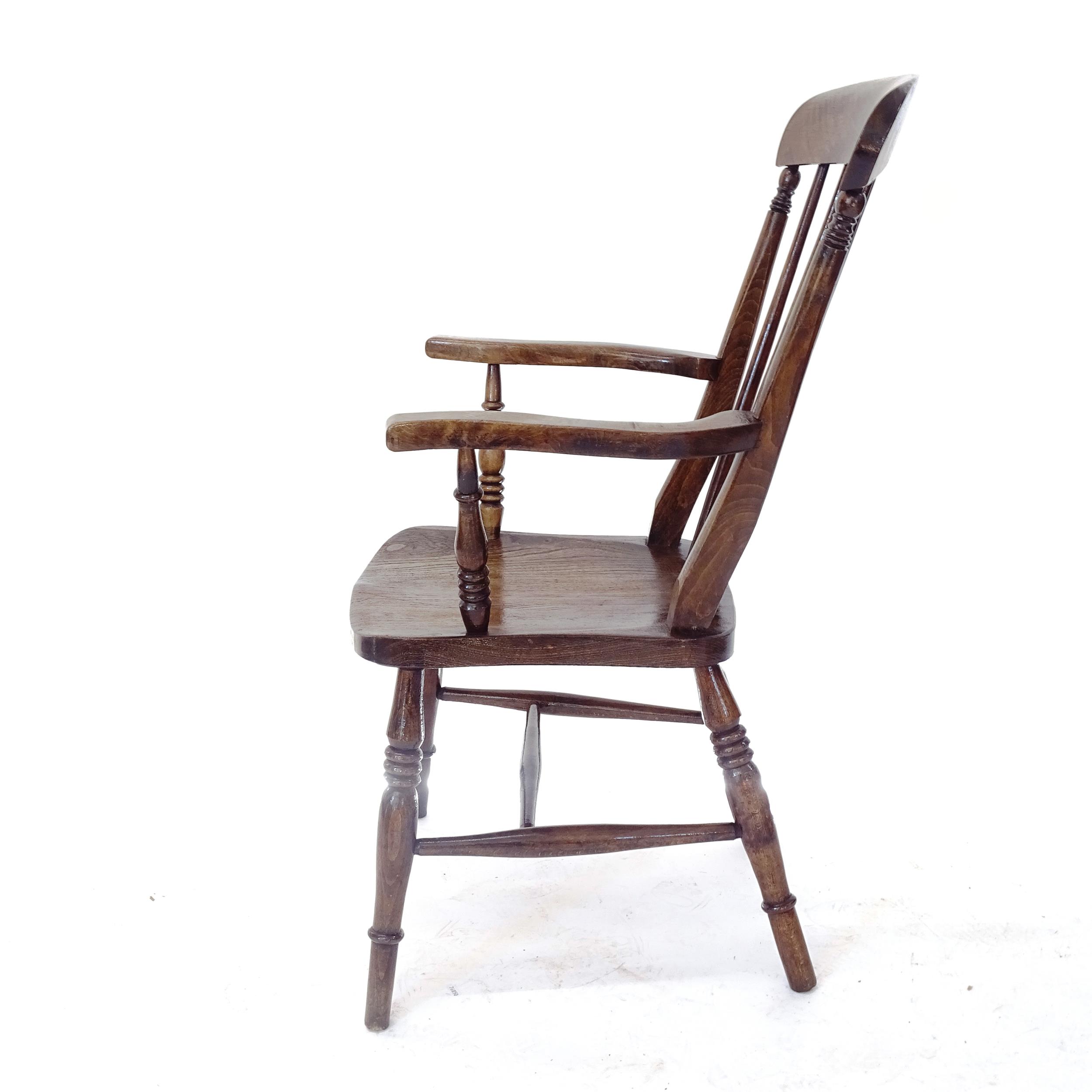 A Victorian and oak elm seated Windsor kitchen armchair - Bild 2 aus 2