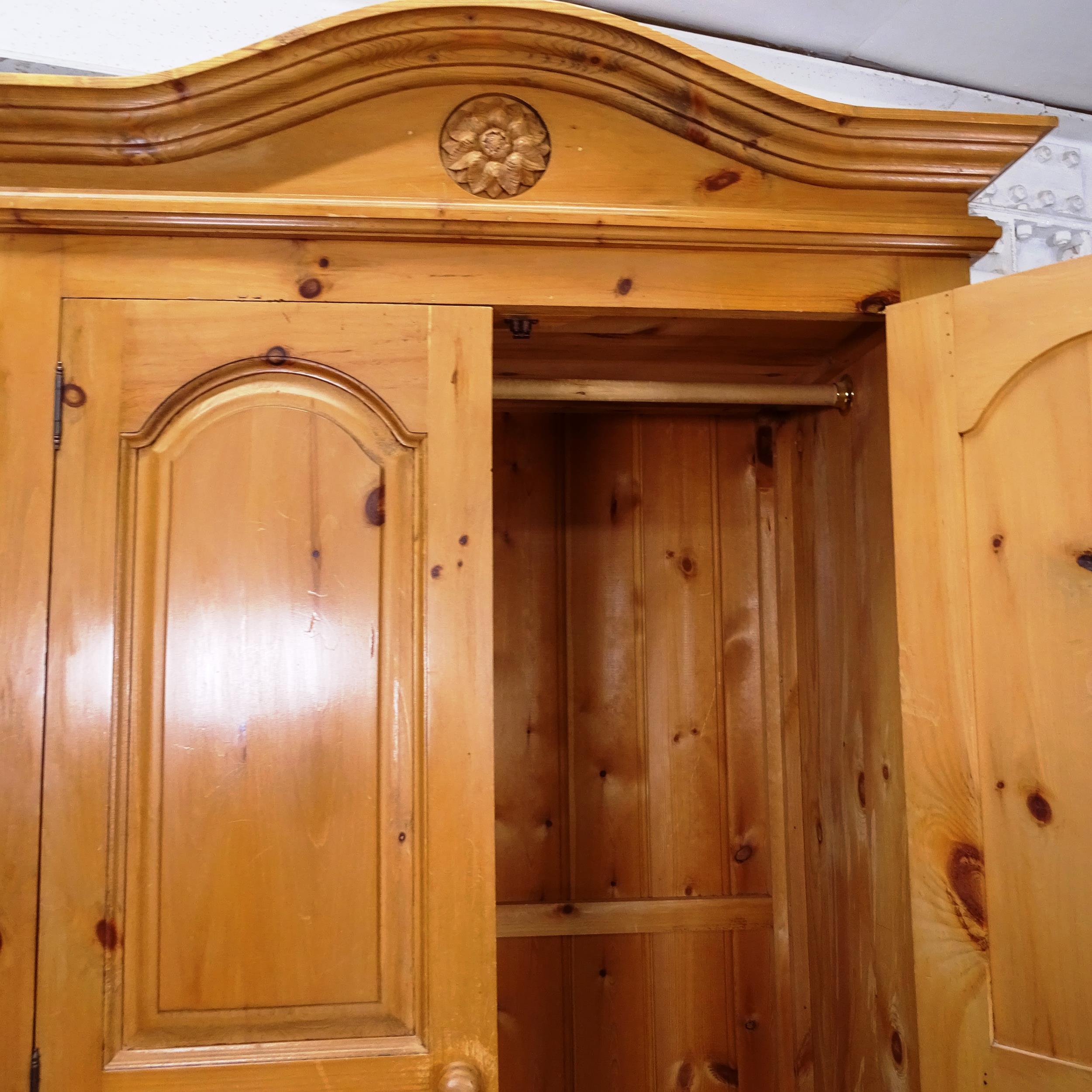 A polished pine 2-door wardrobe with drawer fitted base, W102cm, H215cm, D62cm - Bild 2 aus 2