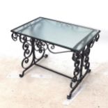 A mid-century Hollywood Regency wrought-iron coffee table, with rippled glass top, L67cm, H49cm,