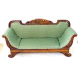 A reproduction Regency style salon settee, with applied and carved decoration on scrolled feet,