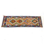 A Chobi Kilim runner, 192cm x 61cm