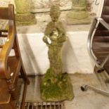 A weathered concrete garden pedestal, surmounted by a flautist, height 85cm