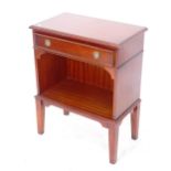 A reproduction mahogany side cabinet, with single drawer and shelf below, W61cm, H77cm, D35cm