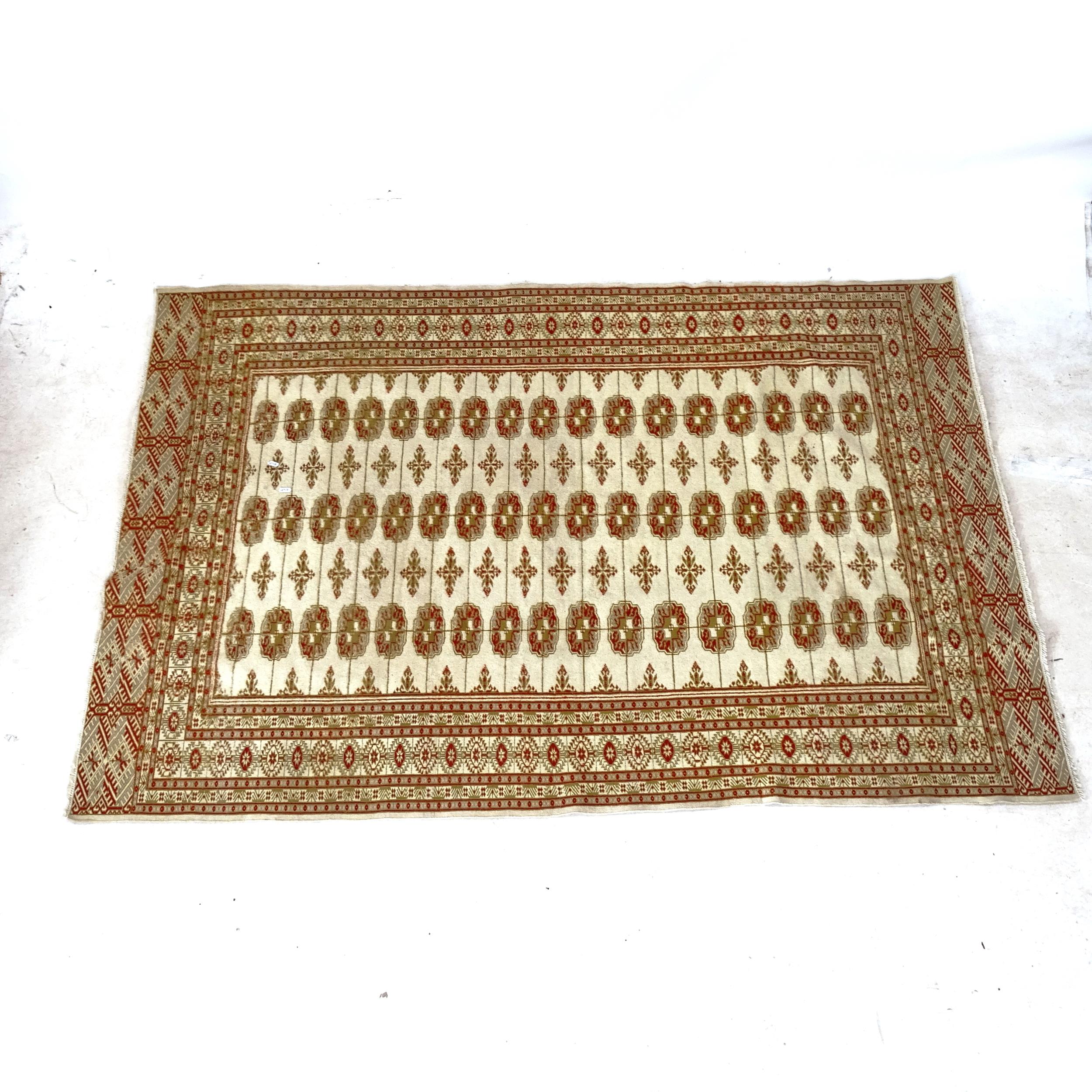 A cream ground wool Tekke design rug, 195cm x 130cm - Image 2 of 2