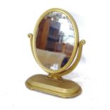 A gilded oval swing toilet mirror, height 90cm