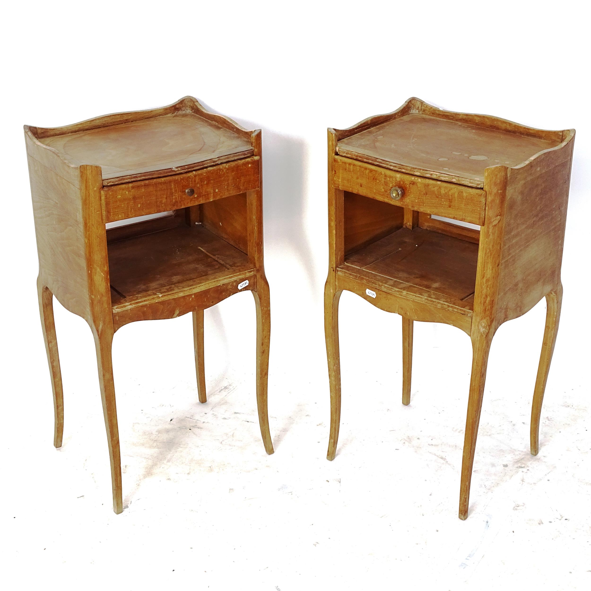 A pair of French walnut bedside pot cupboards, with single frieze drawer