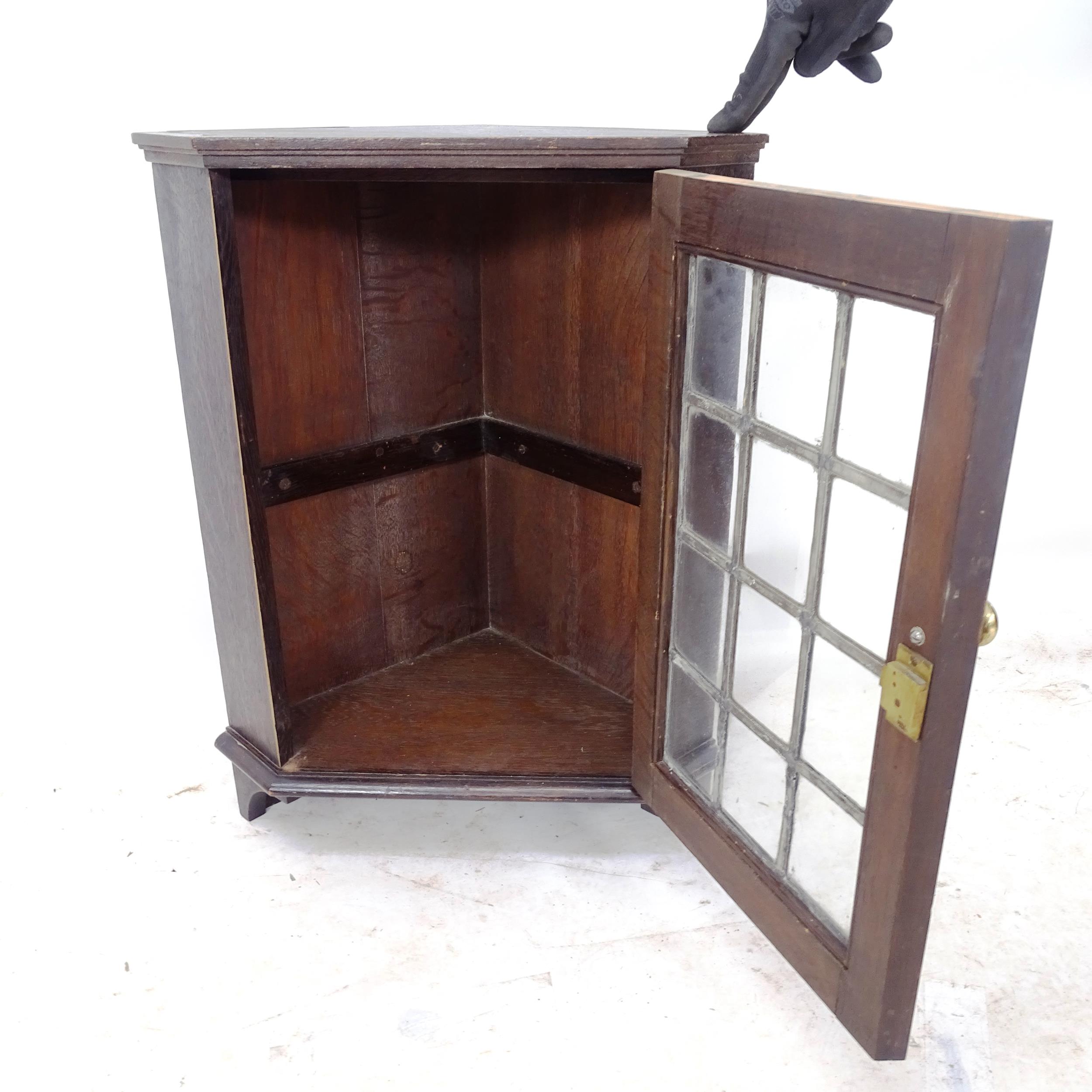 An Antique stained pine hanging corner cabinet, with single glass panelled door, W51cm, H66cm, D32cm - Image 2 of 2