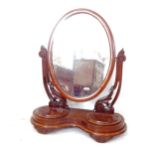 A Victorian mahogany swing toilet mirror, with 2 jewel compartments, W65cm, H77cm, D26cm