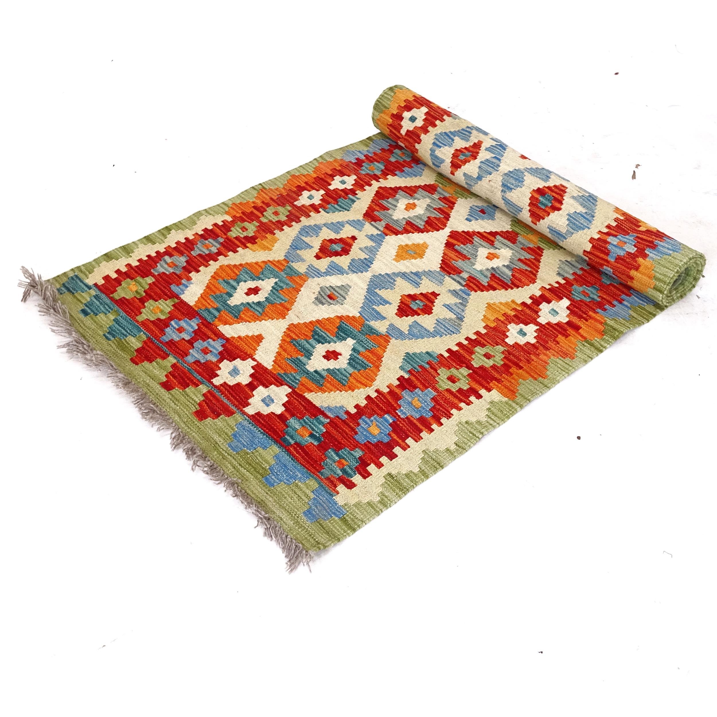 A Chobi Kilim runner, 307cm x 87cm