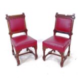 A pair of Victorian Gothic oak side chairs, on turned legs