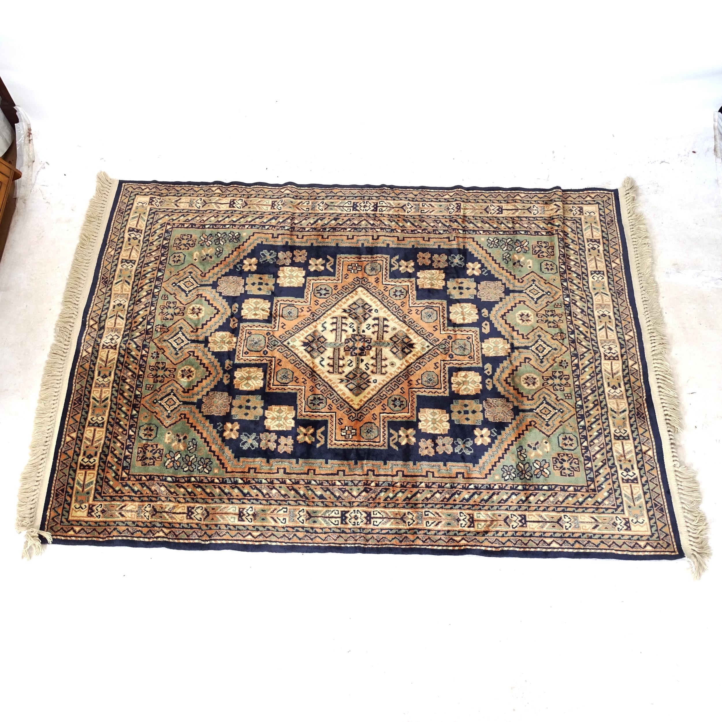 A cream ground silk Persian design rug, 200cm x 140cm