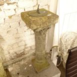 A weathered concrete garden pedestal sundial, height 85cm