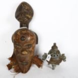 A Marli carved Dogun-double headed mask, and an Oriental censer on tripod support