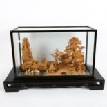 A large Japanese cork panoramic diorama, in glazed black lacquer case, W65cm, H40cm, D28cm