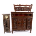 A French carved wood table-top cabinet, 44cm, a similar crib, and miniature longcase clock