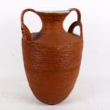 A large painted and incised 2-handled pot, height 43cm