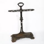 Antique cast-iron umbrella stand with drip tray, height 64cm