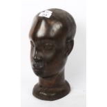 A large African Tribal carved hardwood head, height 30cm