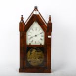 A 19th century rosewood veneered steeple clock, case height 50cm, with pendulum and key