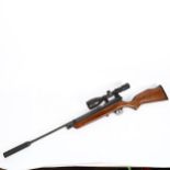 A Cosmk .22 calibre air rifle, with Hawke 3-9x50 scope, serial no. XS78CO2, in softshell gun slip