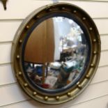 A reproduction gilt-framed circular convex wall mirror, diameter 52cm