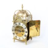 A large 18th century style brass lantern clock, marked Lambert of London, movement stamped