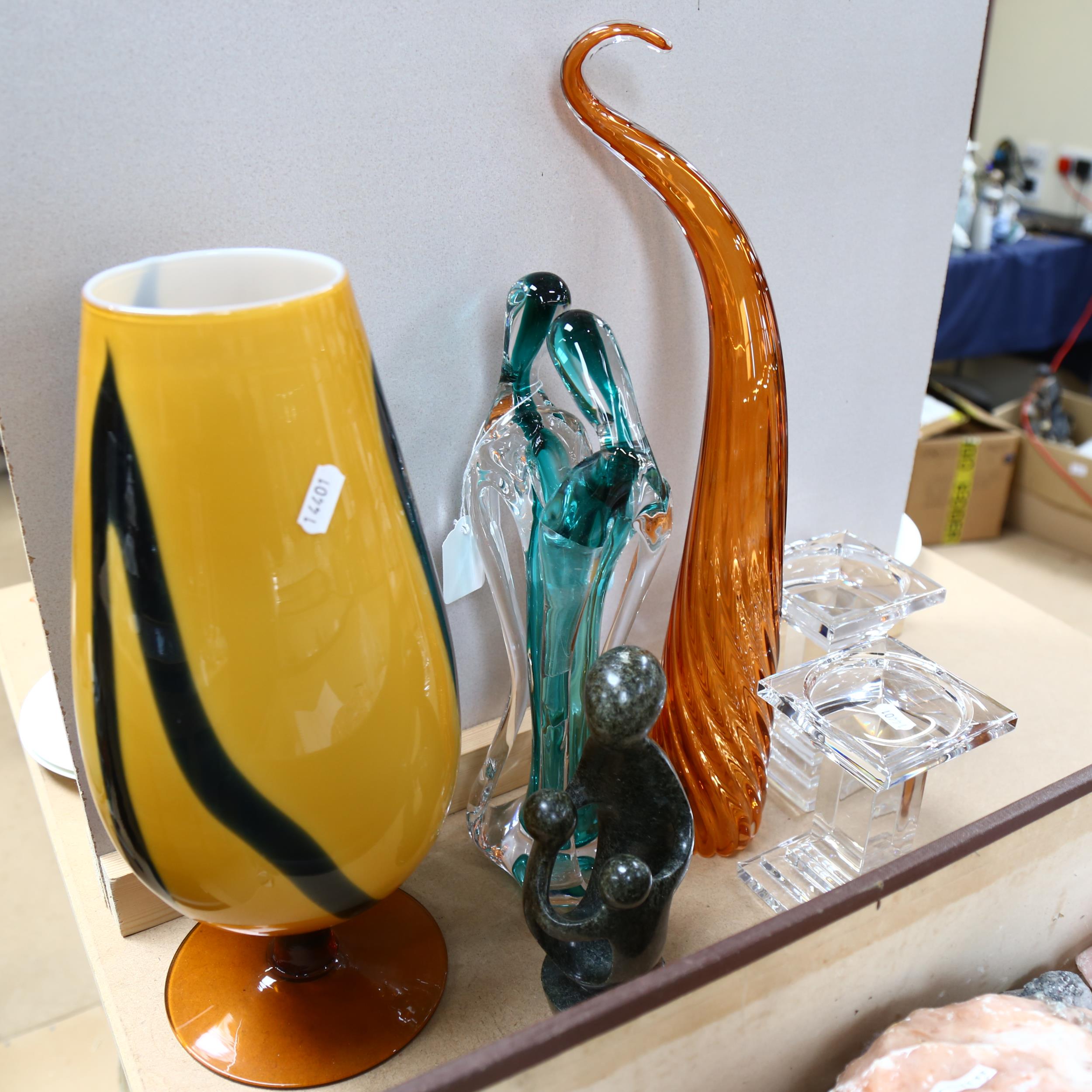Art glass couple, 34cm, glass candle stands, soapstone group etc