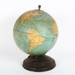 A Vintage table-top 8" standard globe, by Replogle Globes, on black tin stand