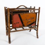 A Victorian Aesthetic Movement chinoiserie bamboo magazine rack, with hand painted and gilded