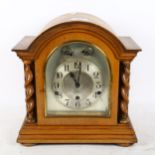 A Charlwoods 8-day striking mantel clock, with barley twist columns, 32cm
