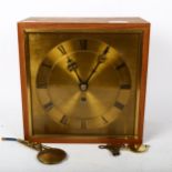 A teak-cased 8 day fusee movement with maintaining power and is fully working, with square brass