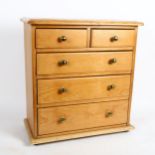 A pine table-top chest of drawers, W47cm, H50cm, D22cm