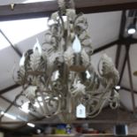 A painted wrought-metal chandelier of foliate design, diameter 48cm approx