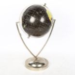 A Vintage black ground 8" terrestrial desk-top globe, height 40cm