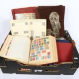 A large quantity of loose postage stamps and albums (boxful)