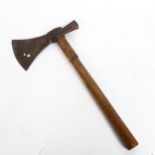 An 18th century Colonial American hatchet, the triangular flaring blade with hammerhead terminal,