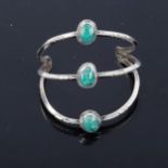 A Native American Navajo unmarked silver and chrysocolla torque bangle, setting height 71mm,