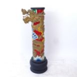 An Oriental resin jardiniere stand, with wrapped dragon decoration, H110cm