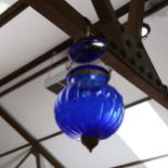 A lobed blue glass pendant light, height 30cm
