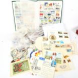 A large quantity of Vintage loose postage stamps and stamp albums