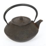 A Japanese Kiyoko black cast-iron teapot, with strainer liner, diameter 15cm No damage or repairs,