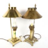 A pair of Antique brass oil lamps with adjustable shade converted to electric
