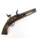 A Middle Eastern brass-mounted flintlock pistol, barrel length 24cm