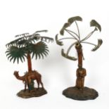 2 Austrian cold painted spelter Arab table lamps, depicting figures under palm trees, height 37cm (