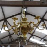 A brass 6-branch chandelier, diameter 56cm approx