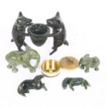 A Roman style patinated bronze pig bowl, a pair of African polished soapstone elephants, jadeite