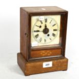 A small early 20th century German mahogany 8-day mantel clock, by Winterhalder & Hofmeier, case