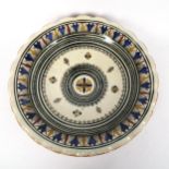 A large Middle Eastern hand painted terracotta pottery bowl, signed, diameter 39cm Rim has a 15cm